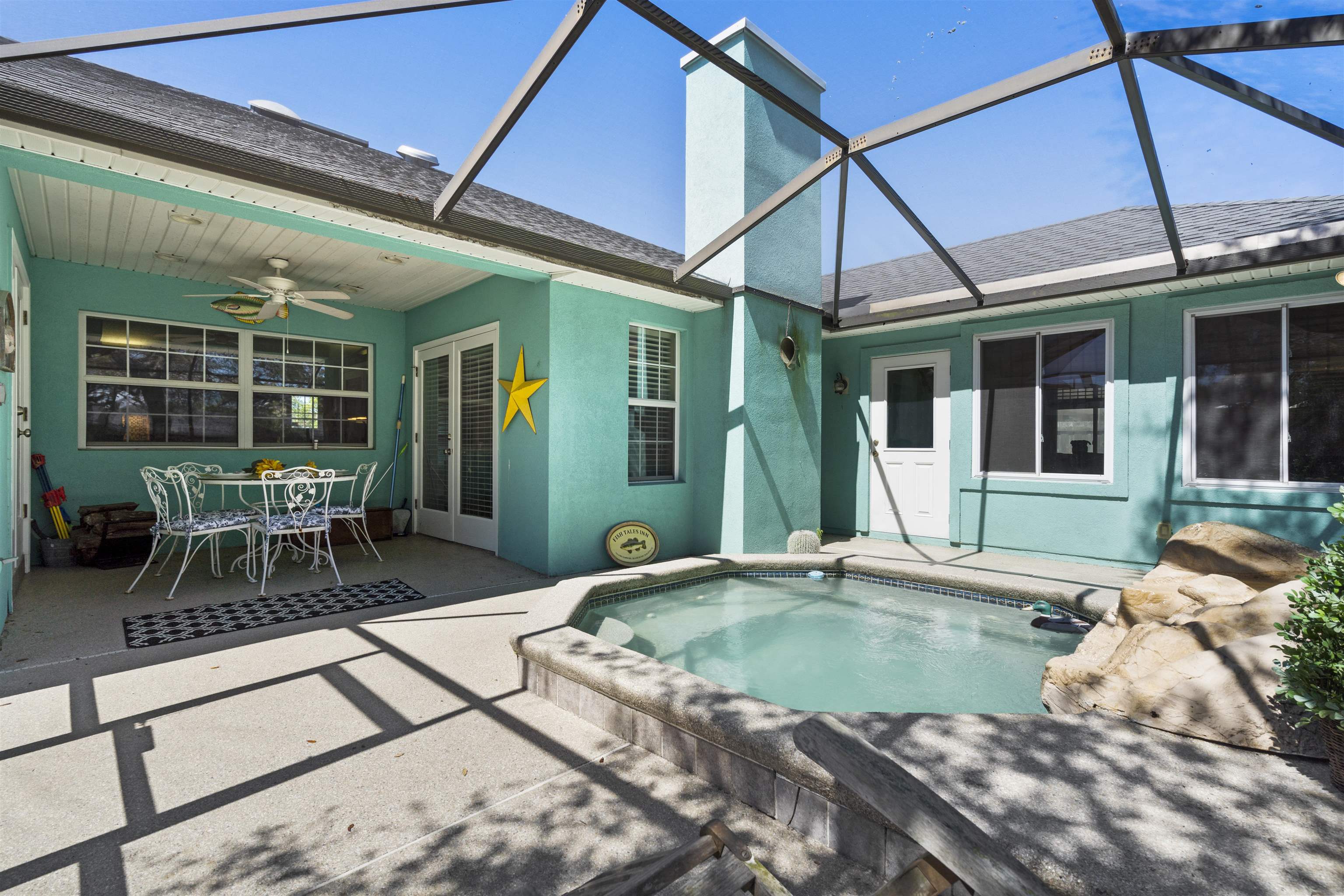 5372 5th Street St. Augustine, FL 32080 - Photo 32 of 46 a view of a house with patio