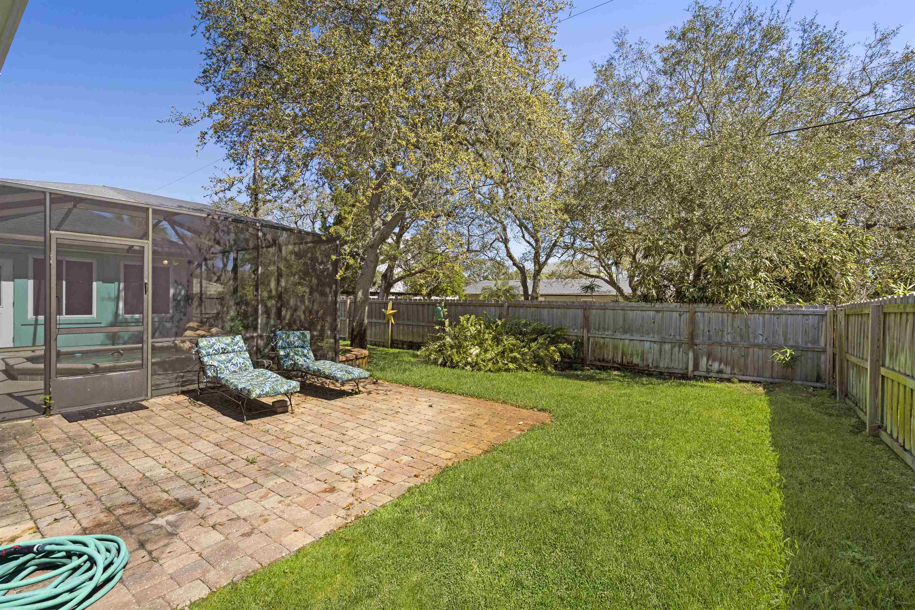 5372 5th Street St. Augustine, FL 32080 - Photo 36 of 46 a view of a backyard with sitting area