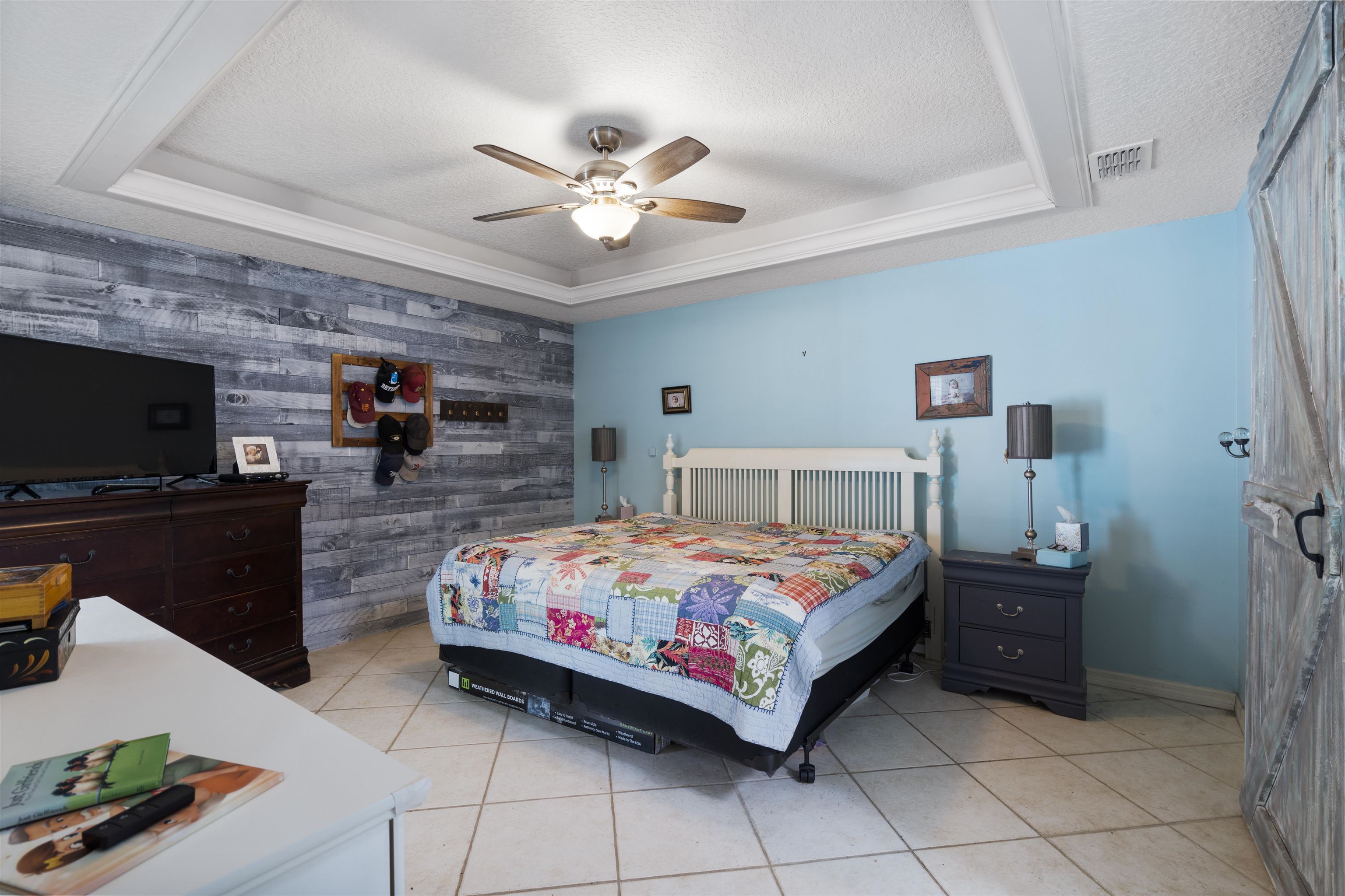 5372 5th Street St. Augustine, FL 32080 - Photo 5 of 46 a bedroom with a bed and a television