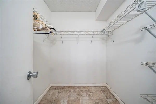 a view of a room with racks on the wall