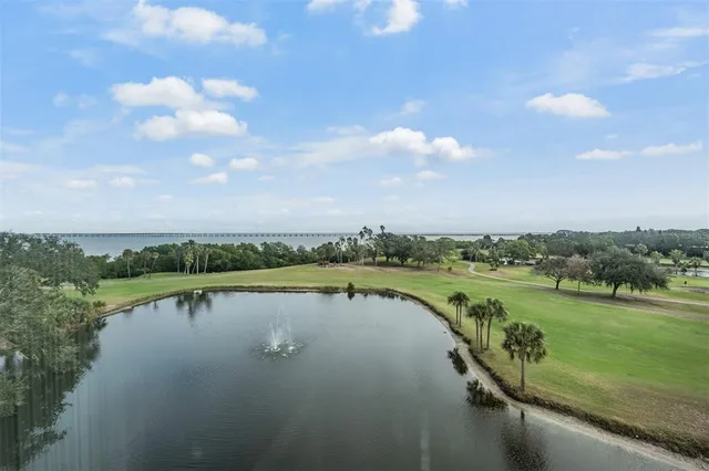 a view of a lake with a city