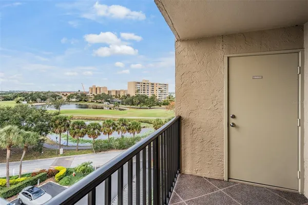 a view of balcony with city and lake view