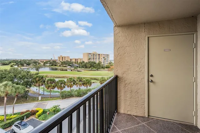 a view of balcony with city and lake view