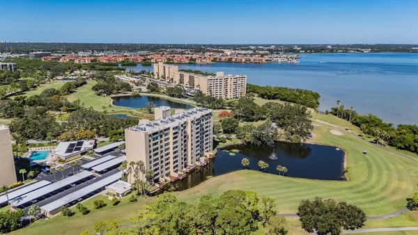 a view of a lake with a city