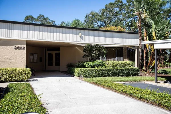 a view of a swimming pool with a patio
