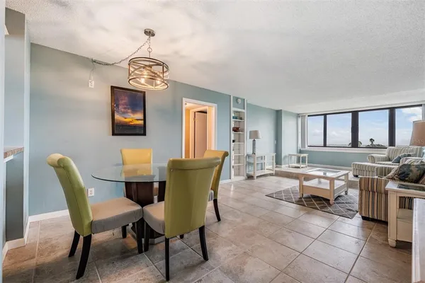 a view of a dining room with furniture