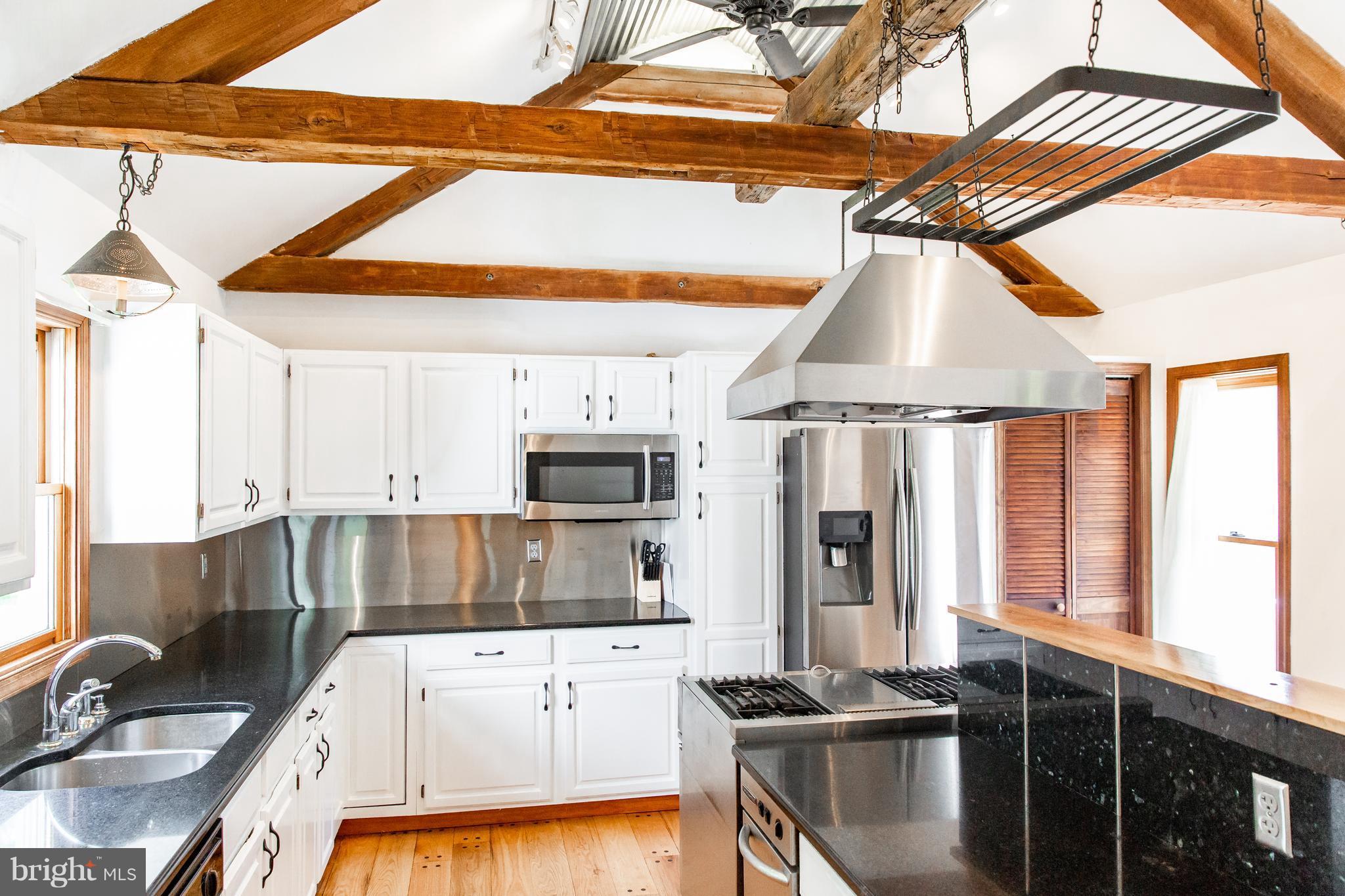 7721 Gaither Road Sykesville, MD 21784 - Photo 2 of 27 Modern Farmhouse kitchen!! Gorgeous exposed beams