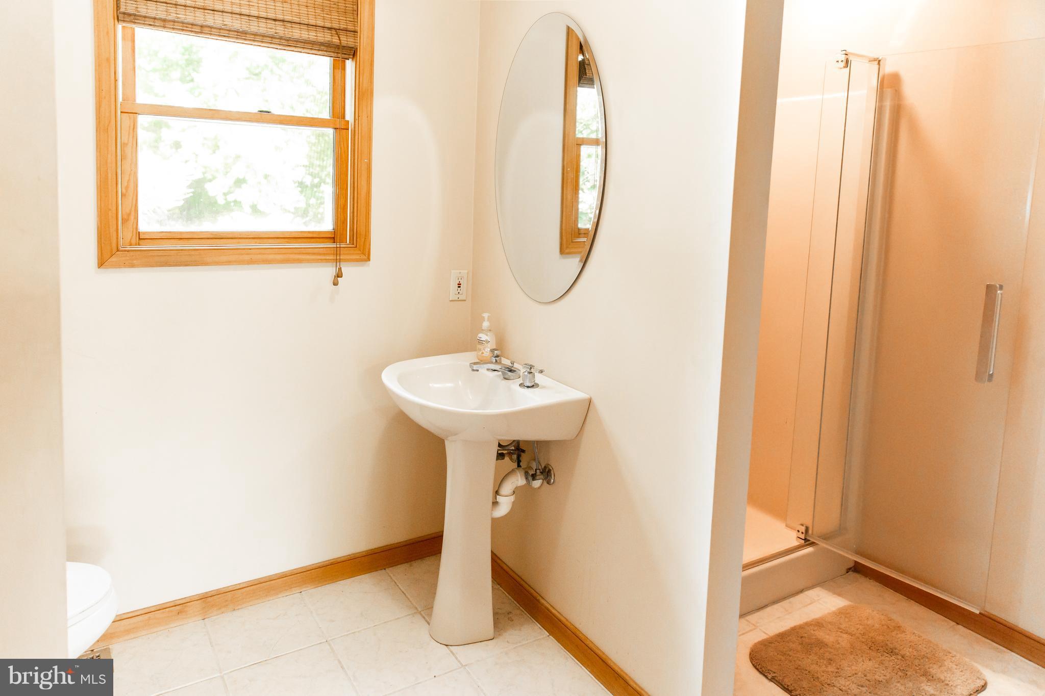 7721 Gaither Road Sykesville, MD 21784 - Photo 12 of 27 Full bath & laundry on main level
