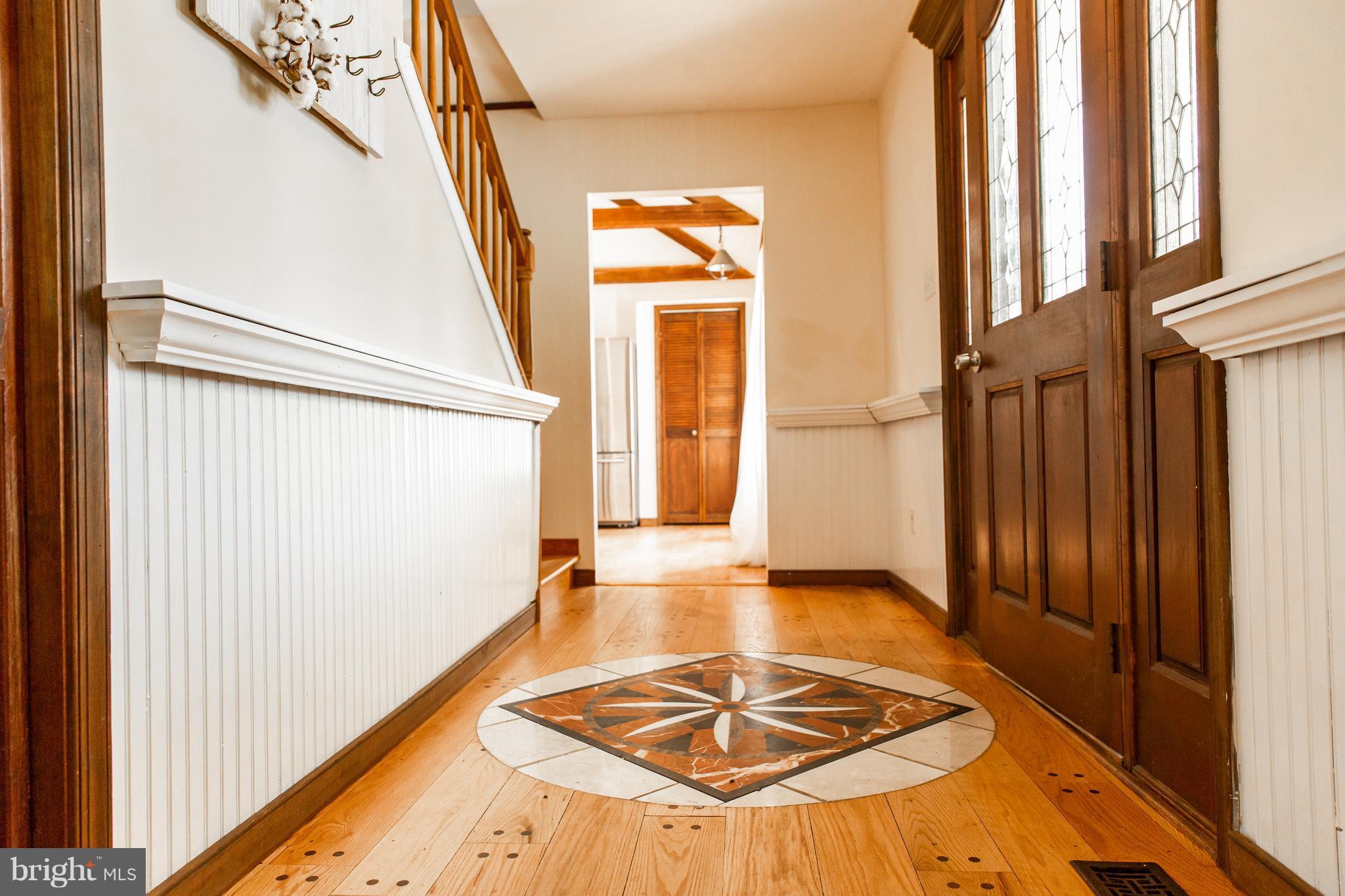 7721 Gaither Road Sykesville, MD 21784 - Photo 4 of 27 Foyer w mosaic & beautiful solid leaded doors!
