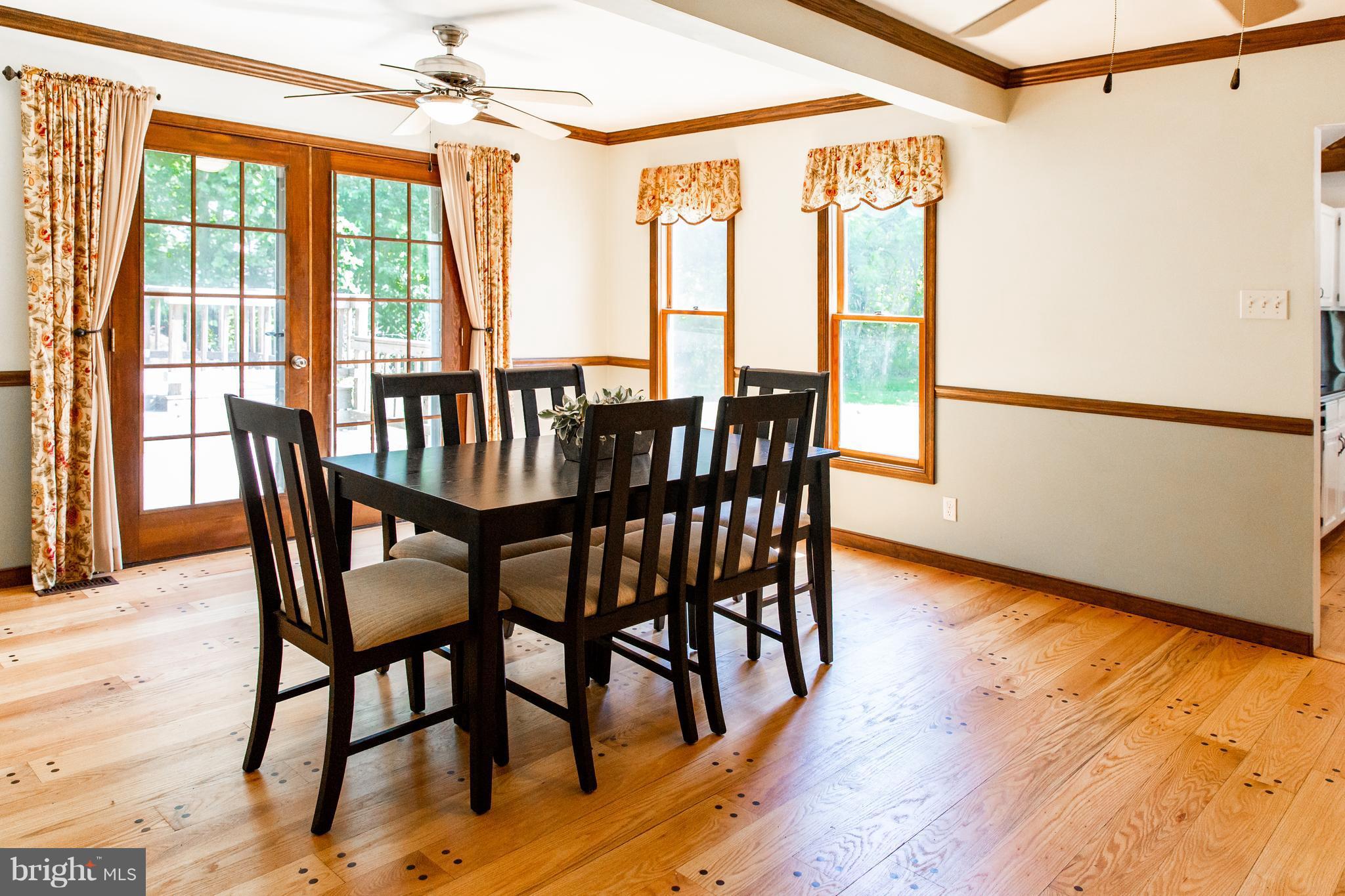 7721 Gaither Road Sykesville, MD 21784 - Photo 6 of 27 Dining room w builtins & french doors to deck