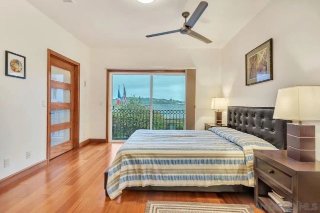 a bathroom with a shower and toilet