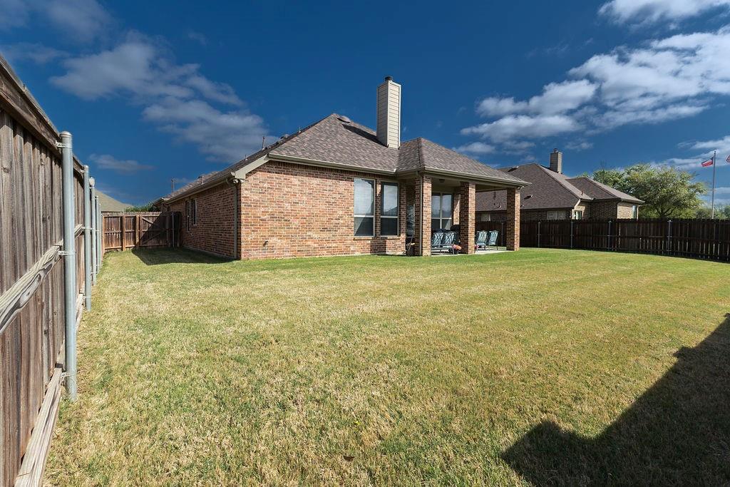 544 Madrone Trail Forney, TX 75126 - Photo 23 of 23 a view of a house with a yard