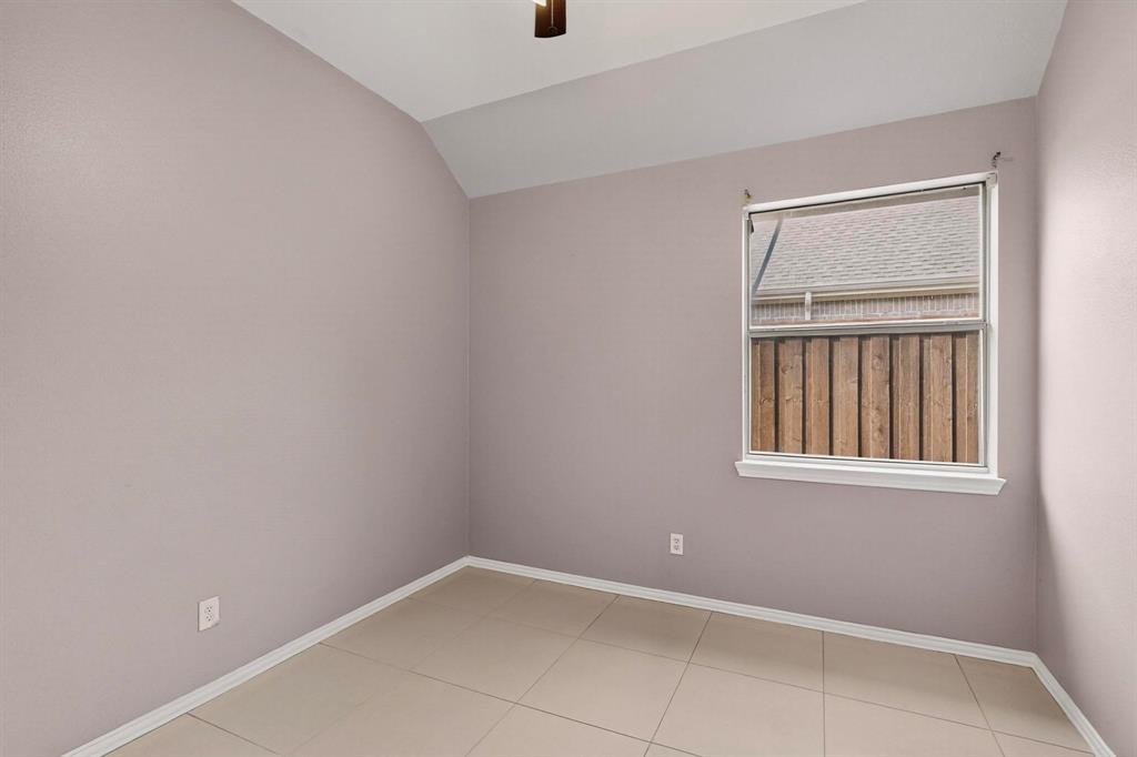 1122 Leafy Glade Road Forney, TX 75126 - Photo 13 of 19 an empty room with windows