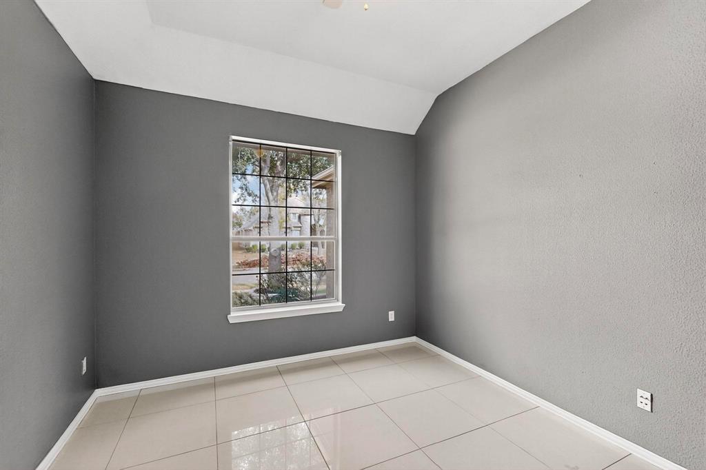 1122 Leafy Glade Road Forney, TX 75126 - Photo 15 of 19 a view of an empty room with a window