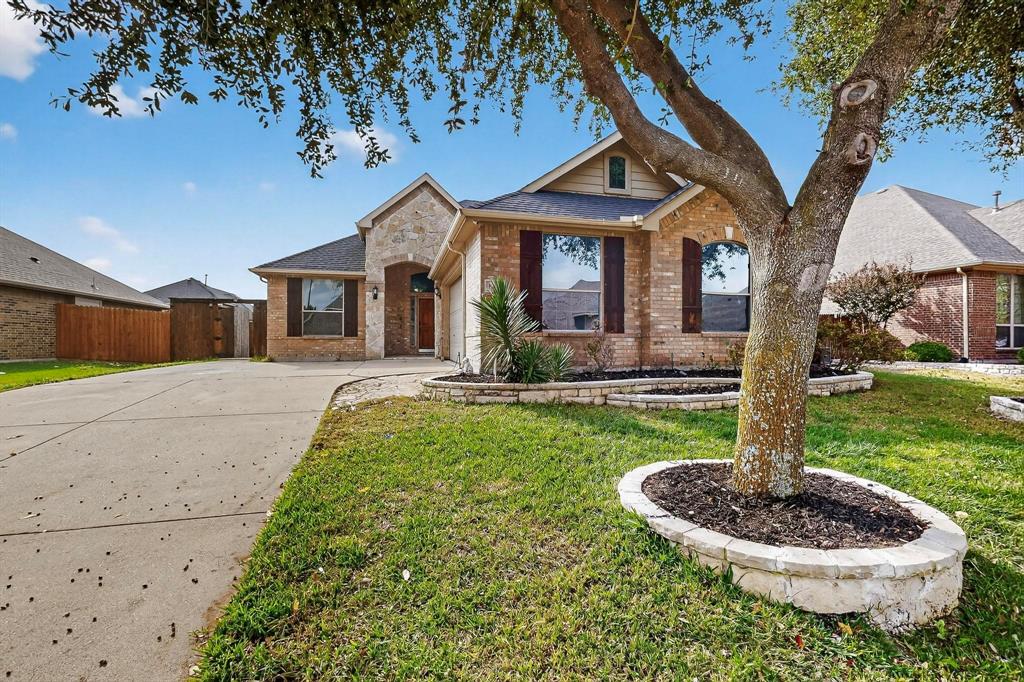1122 Leafy Glade Road Forney, TX 75126 - Photo 2 of 19 a front view of a house with a yard