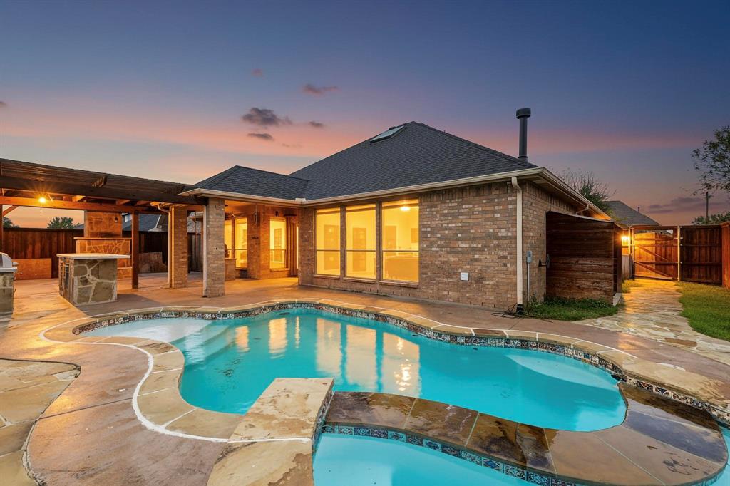 1122 Leafy Glade Road Forney, TX 75126 - Photo 3 of 19 a view of a house with swimming pool