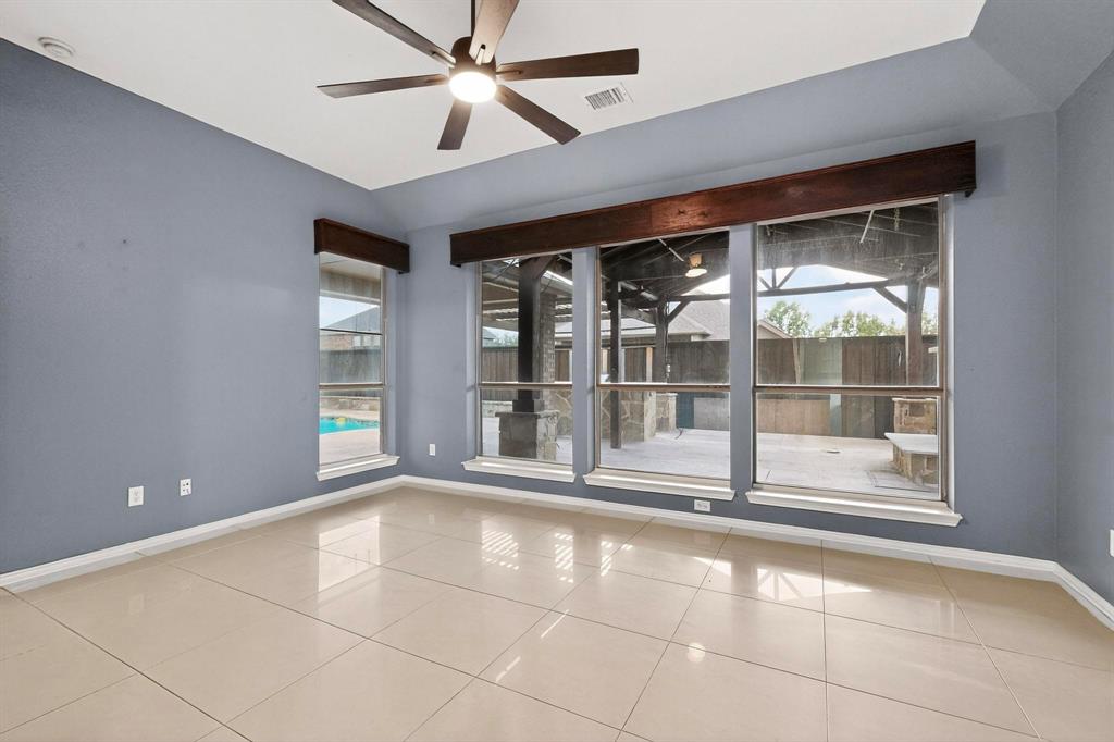 1122 Leafy Glade Road Forney, TX 75126 - Photo 10 of 19 a view of an empty room with a window