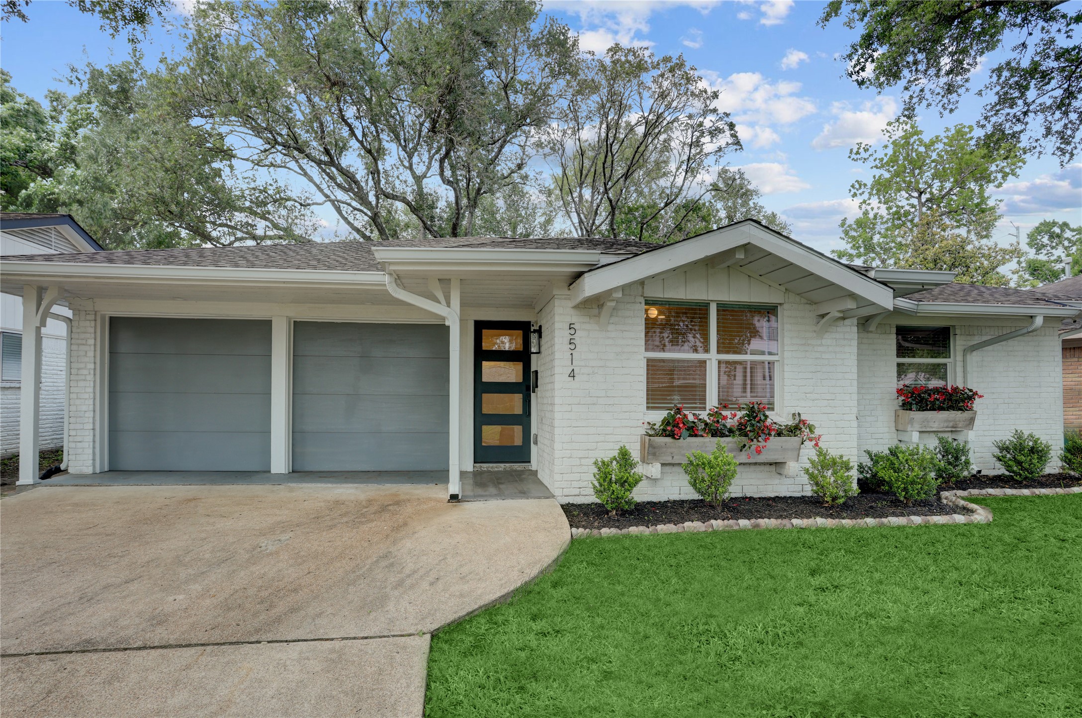 5514 Indigo Street Houston, TX 77096 - Photo 2 of 22 front view of a house with a yard
