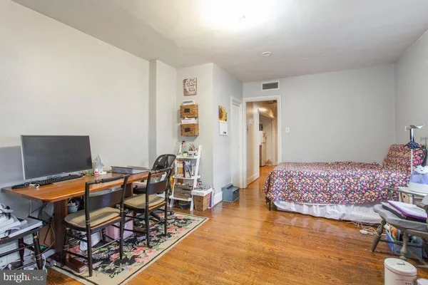 a outdoor space with furniture and wooden floor