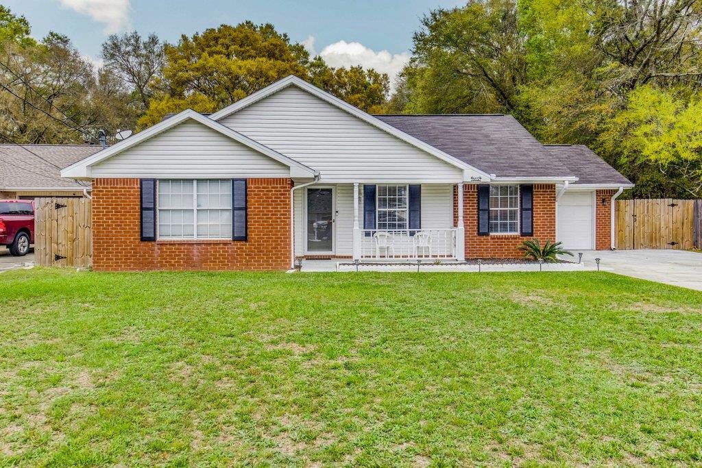 6612 Ridge Crest Drive Milton, FL 32570 - Photo 1 of 47 Quiet subdivision with covered front porch