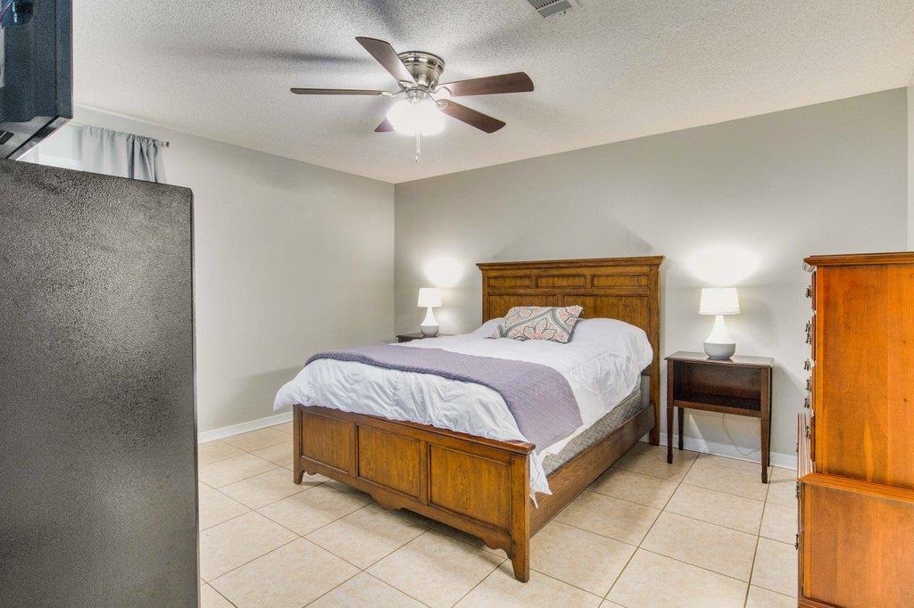6612 Ridge Crest Drive Milton, FL 32570 - Photo 20 of 47 Large master bedroom with on suite bathroom