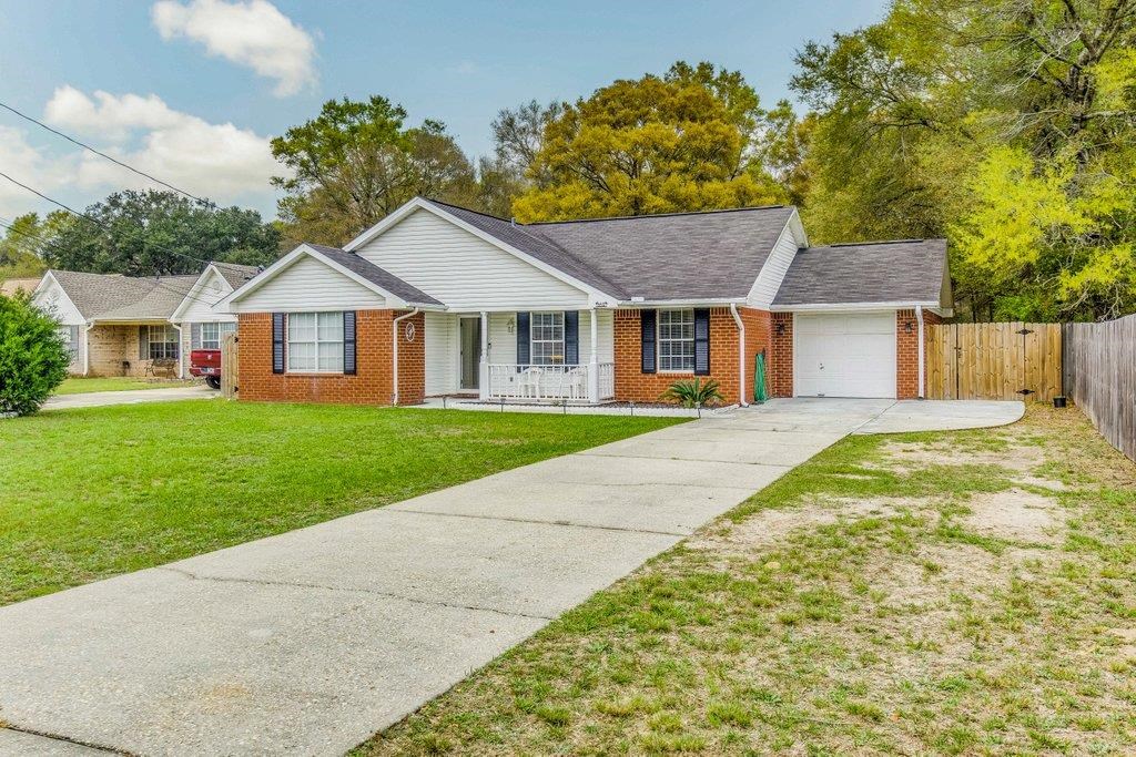 6612 Ridge Crest Drive Milton, FL 32570 - Photo 2 of 47 1 car garage with long driveway and extra pad