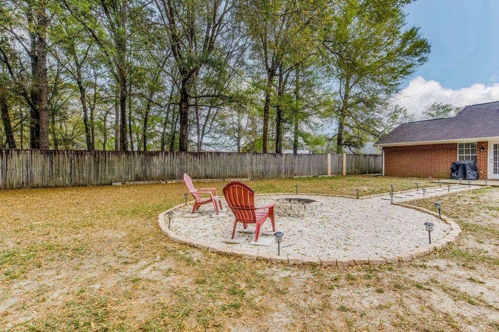 6612 Ridge Crest Drive Milton, FL 32570 - Photo 44 of 47 Firepit seating area