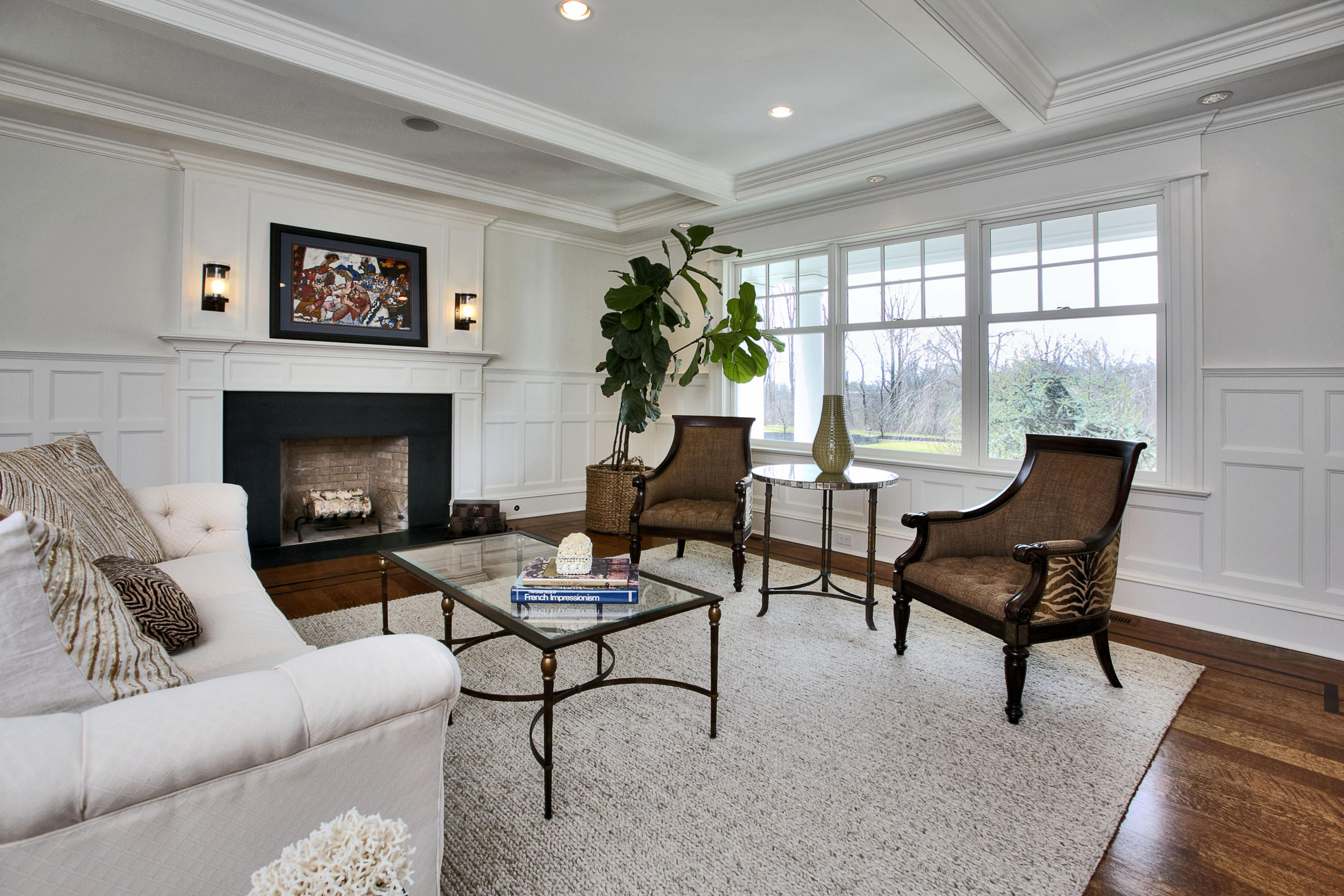 1385 Smith Ridge Road New Canaan, CT 06840 - Photo 14 of 33 a living room with furniture and a fireplace