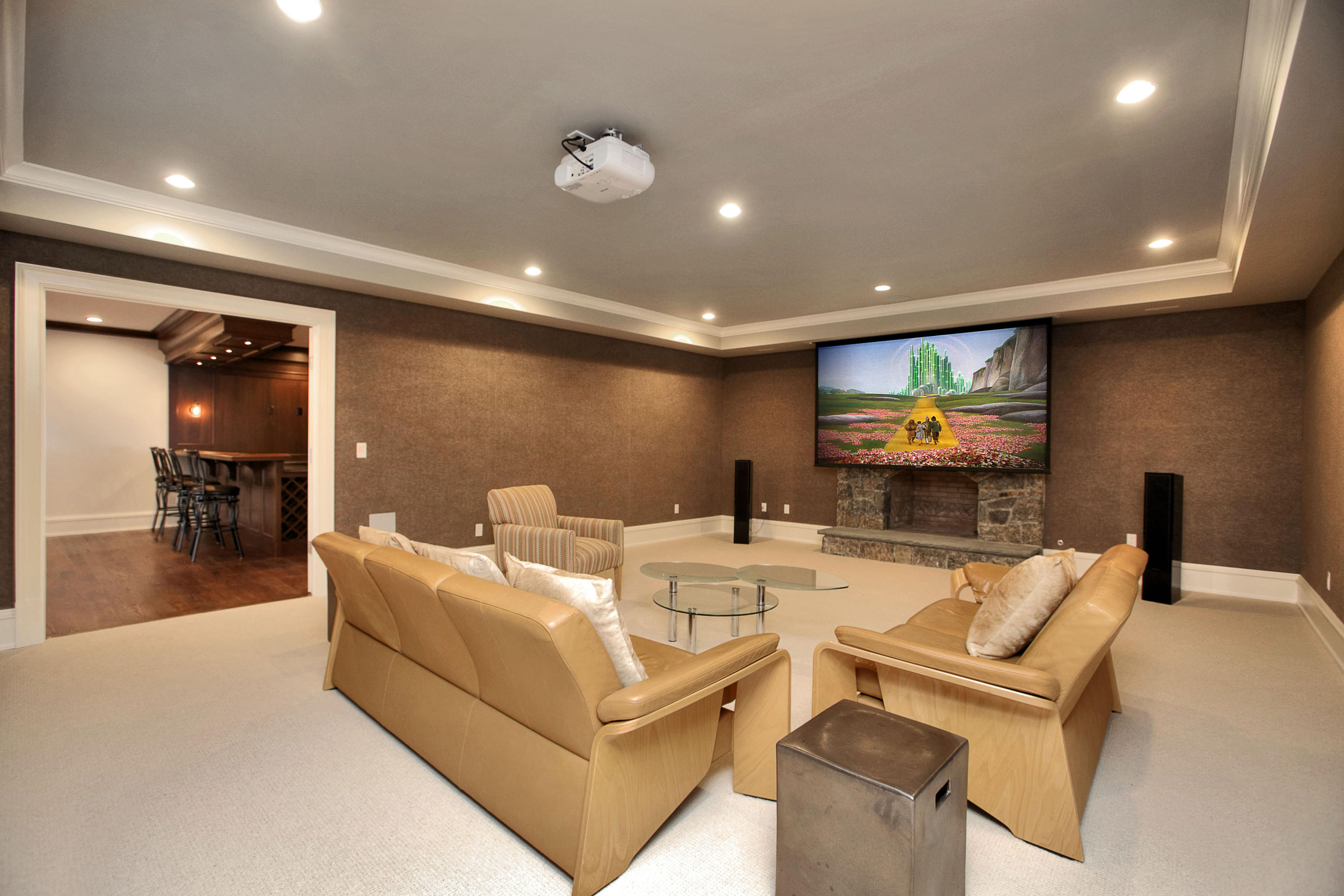 1385 Smith Ridge Road New Canaan, CT 06840 - Photo 21 of 33 a living room with furniture and a flat screen tv