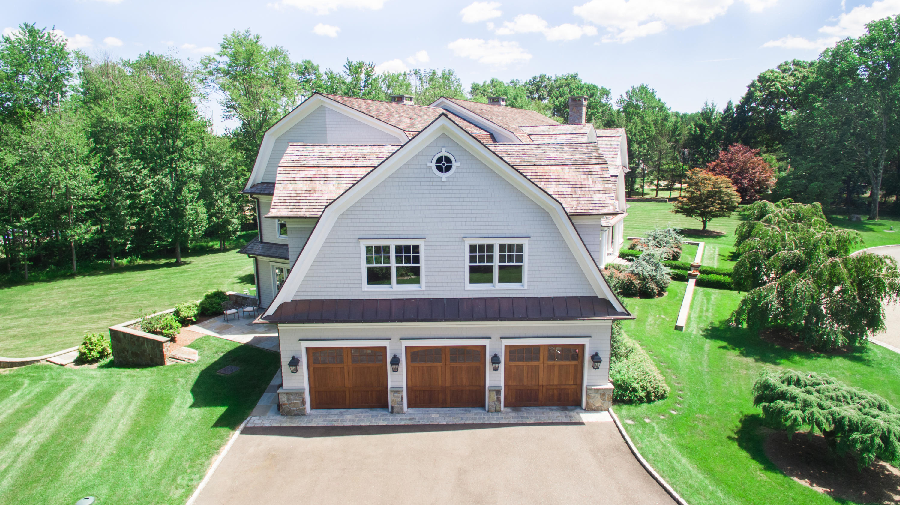 1385 Smith Ridge Road New Canaan, CT 06840 - Photo 31 of 33 a house view with a garden space