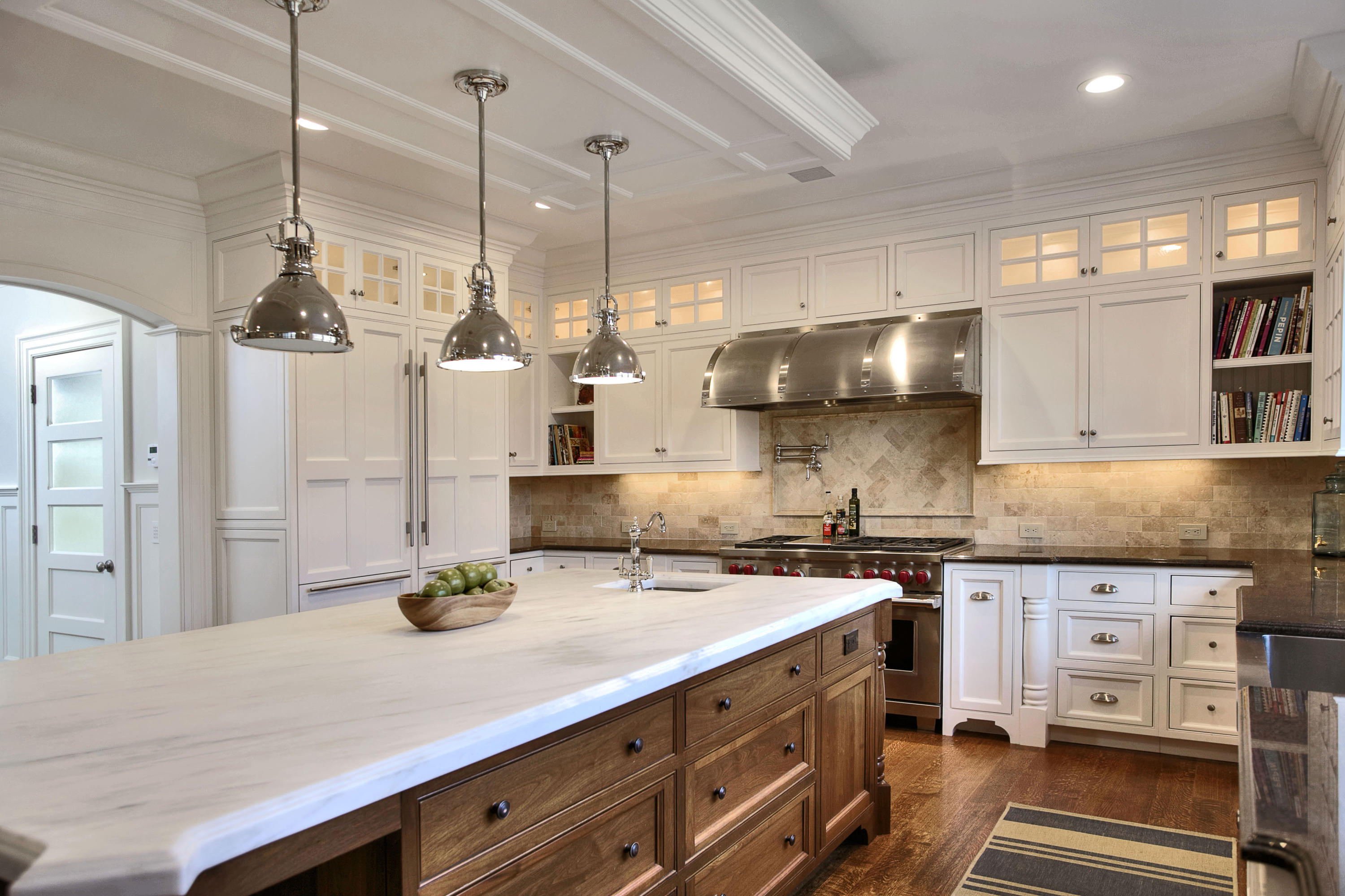 1385 Smith Ridge Road New Canaan, CT 06840 - Photo 9 of 33 a kitchen with a sink a stove and chairs