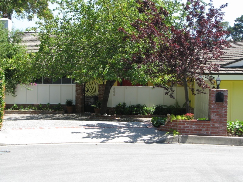 866 Deerpath Road Santa Barbara, CA 93108 - Photo 4 of 31 a front view of a house with a yard and garage