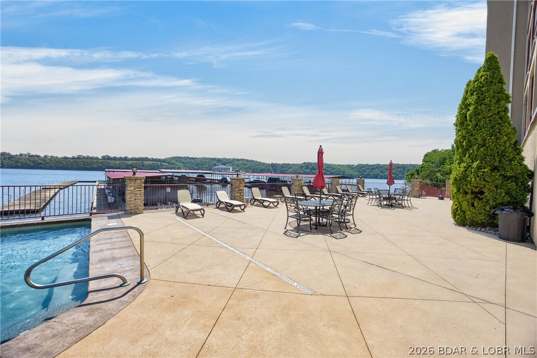 3168 Twin Rivers Point, Unit 2B Camdenton, MO 65020 - Photo 61 of 92 Pool Side & Lake Front Larger Sunning & Gathering