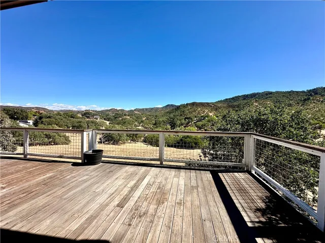 a view of balcony with furniture