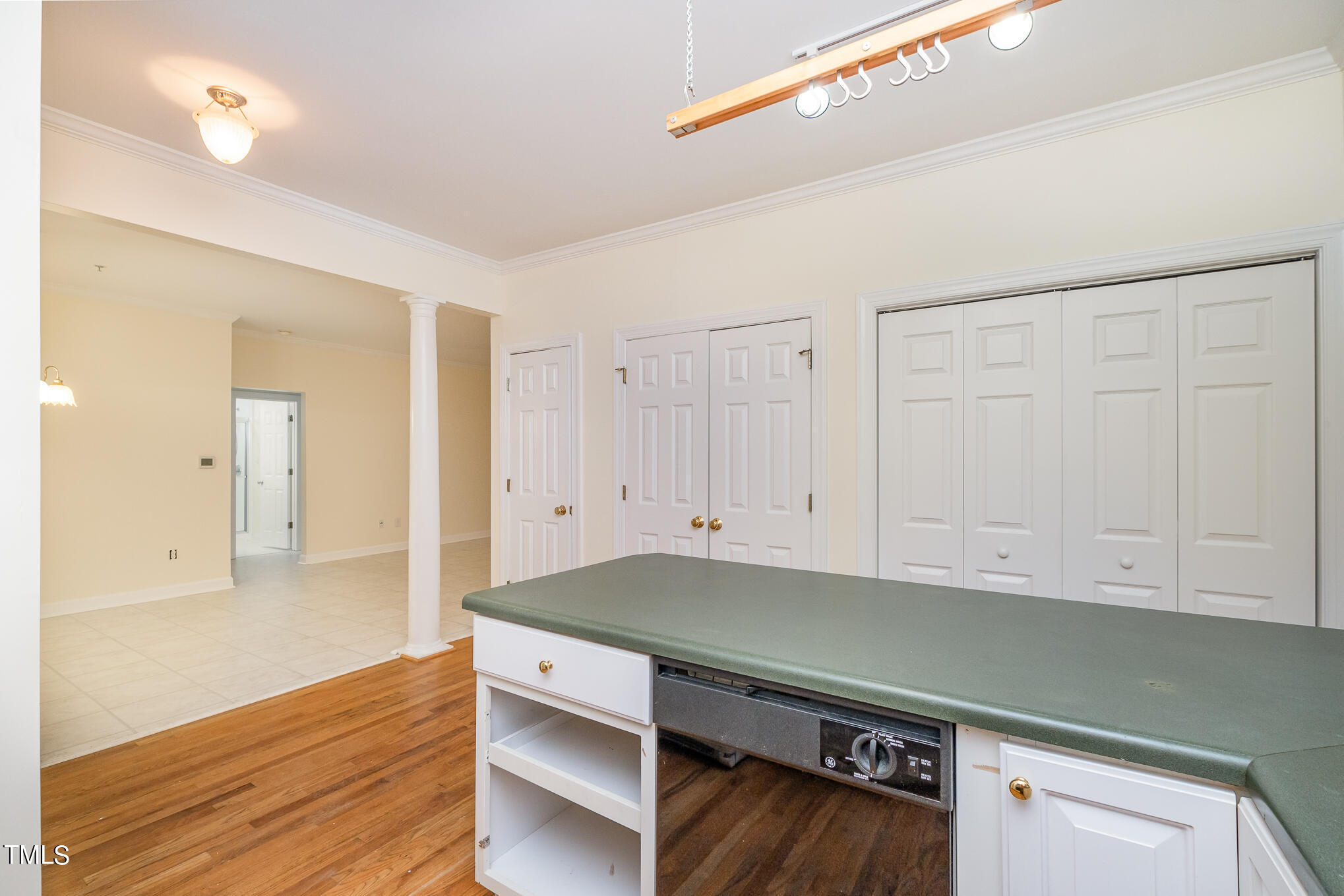 2651 Mellowfield Drive, Unit 107 Raleigh, NC 27604 - Photo 4 of 15 a view of a kitchen with wooden floor