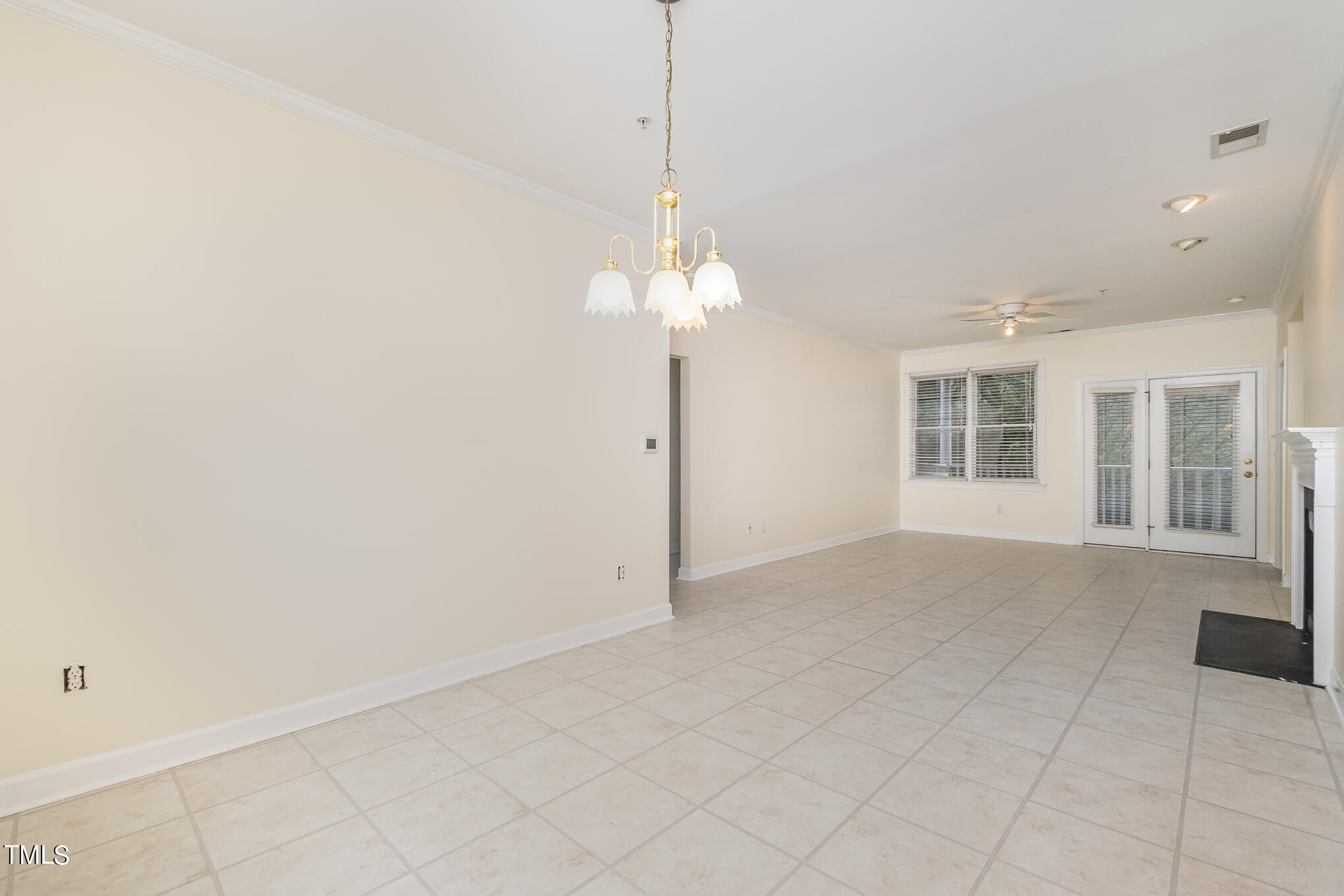 2651 Mellowfield Drive, Unit 107 Raleigh, NC 27604 - Photo 5 of 15 a view of an empty room with a window