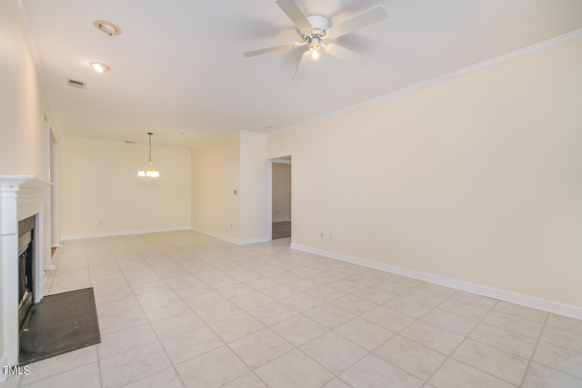 2651 Mellowfield Drive, Unit 107 Raleigh, NC 27604 - Photo 7 of 15 an empty room with closet and a ceiling fan