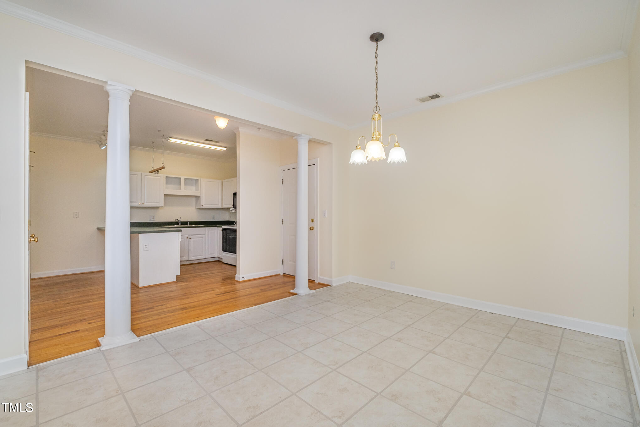 2651 Mellowfield Drive, Unit 107 Raleigh, NC 27604 - Photo 8 of 15 a view of an empty room and kitchen view