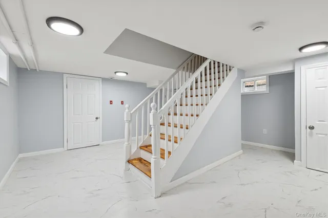a view of an entryway with staircase