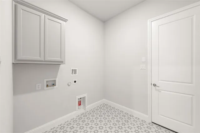 a walk in closet with white paint