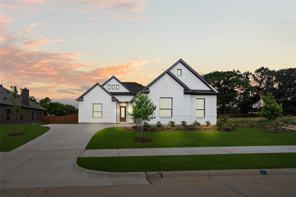 4021 Alpine Street Midlothian, TX 76065 - Photo 29 of 30 a front view of a house with a yard and garage