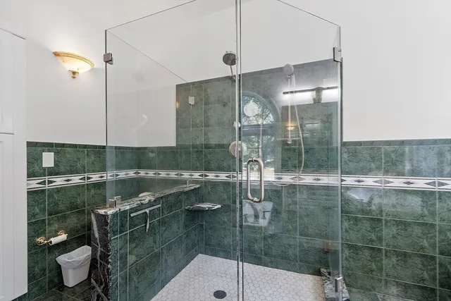 a utility room with dryer washer and other items