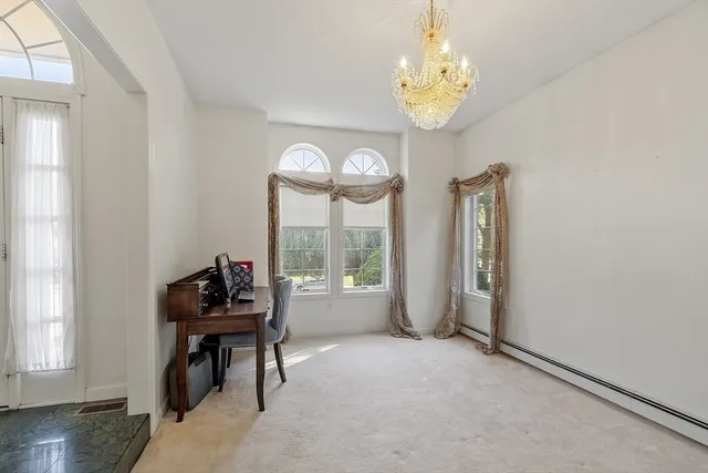 a view of a livingroom with furniture window and outside view
