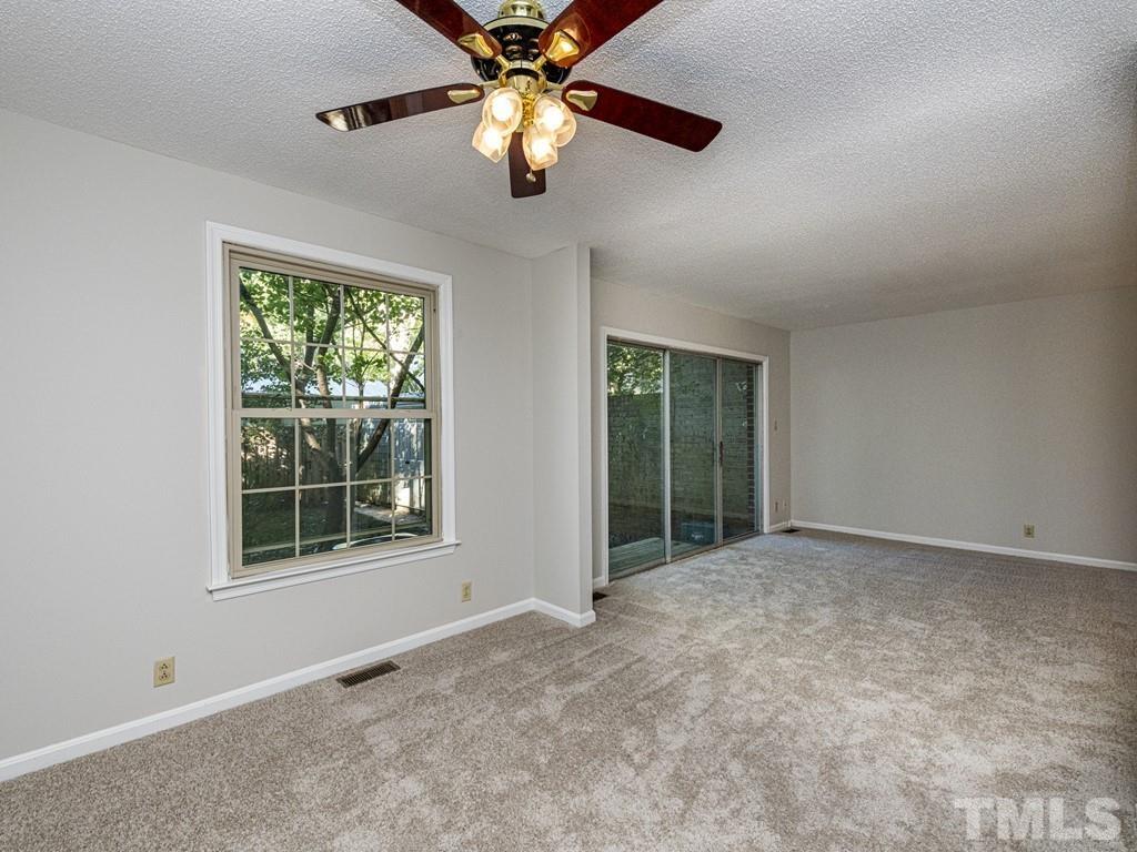 2933 Wycliff Road Raleigh, NC 27607 - Photo 14 of 30 a view of an empty room with a window