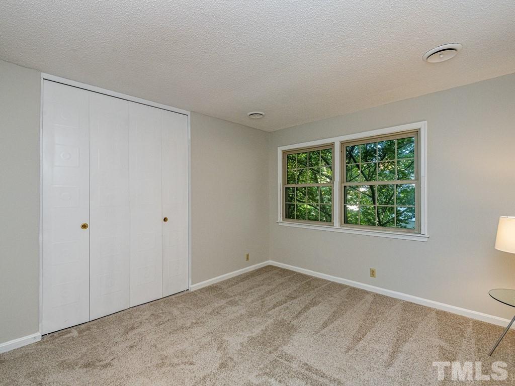 2933 Wycliff Road Raleigh, NC 27607 - Photo 22 of 30 a view of an empty room with a window