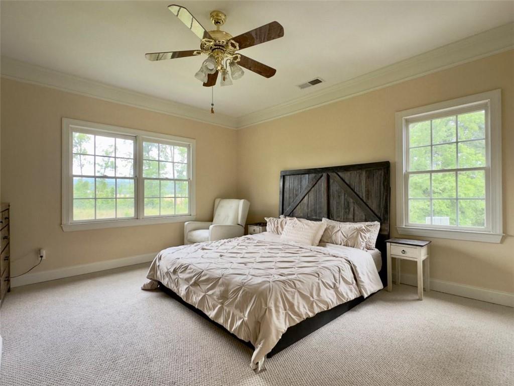 11 Stonegable Drive Northwest Rome, GA 30165 - Photo 13 of 32 a bedroom with a bed and a window