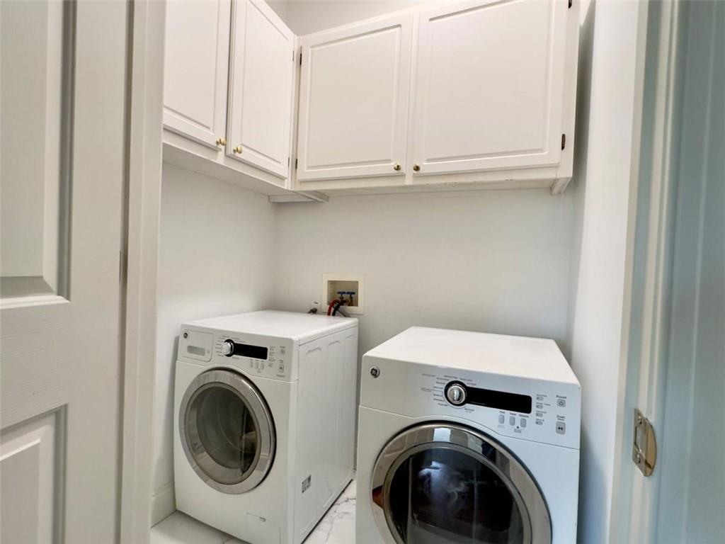 11 Stonegable Drive Northwest Rome, GA 30165 - Photo 23 of 32 a utility room with dryer and washer