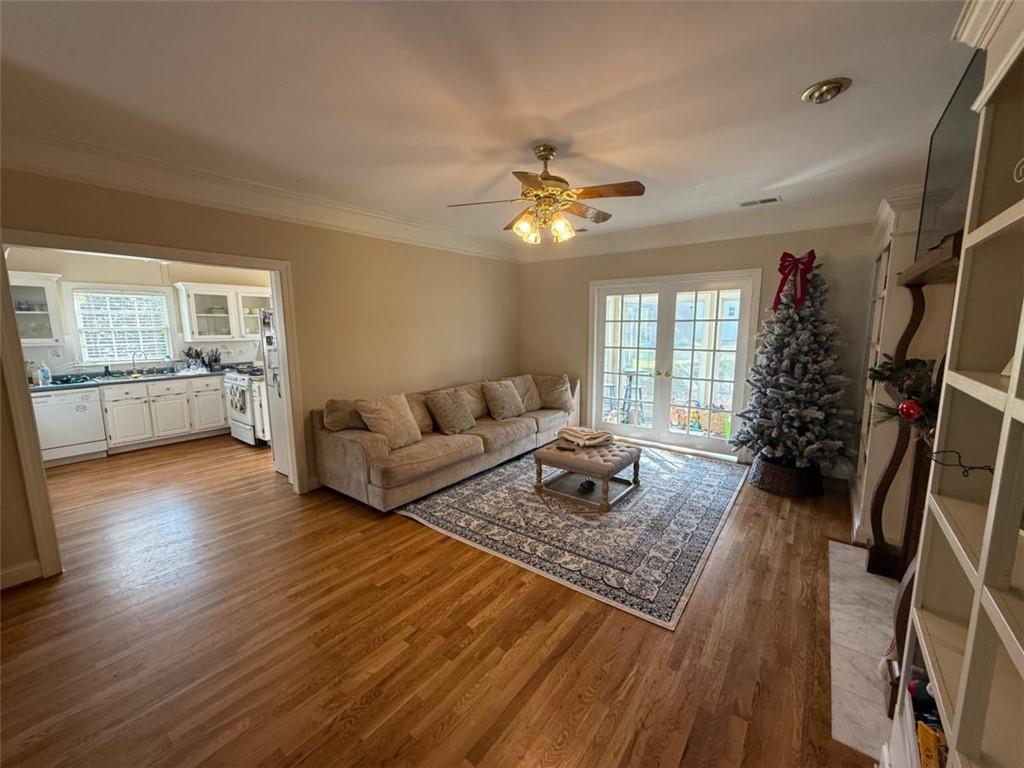 11 Stonegable Drive Northwest Rome, GA 30165 - Photo 10 of 32 a living room with furniture and a wooden floor