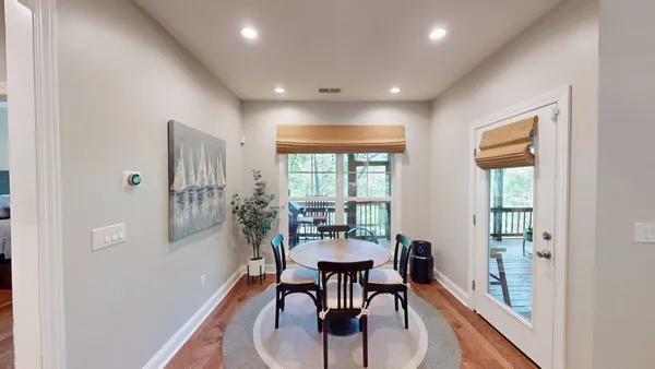 a view of room with toys and wooden floor