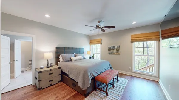 a bathroom with a sink a mirror and a shower